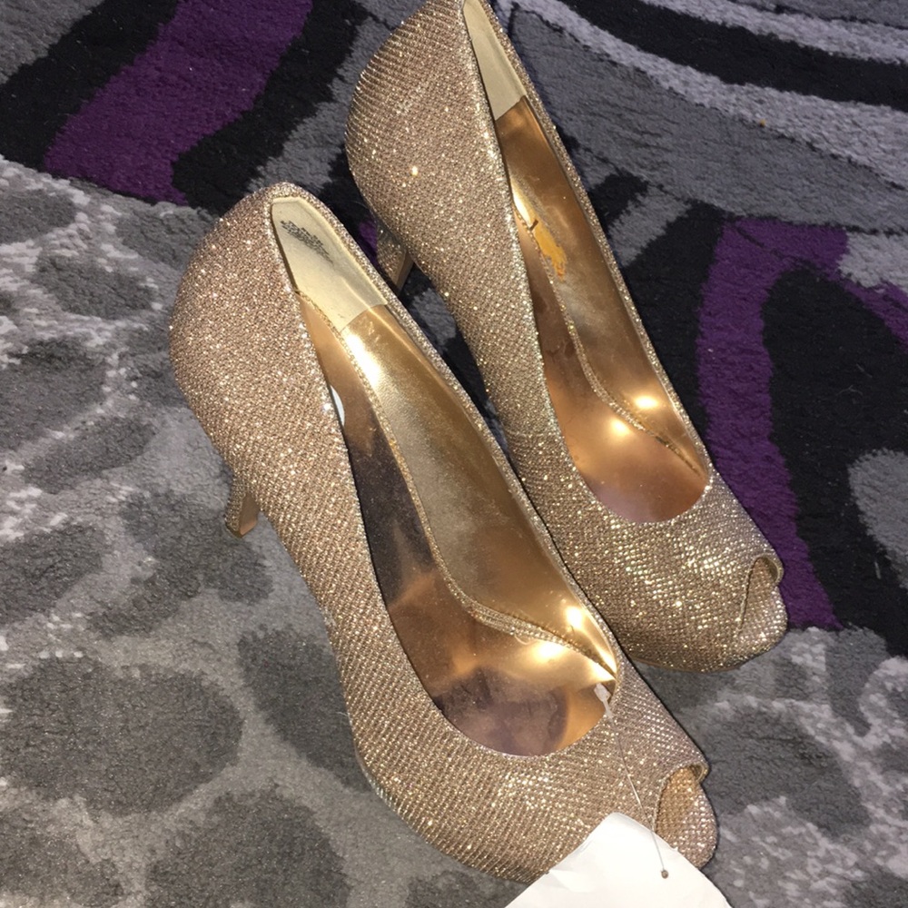 Never worn gold shoes